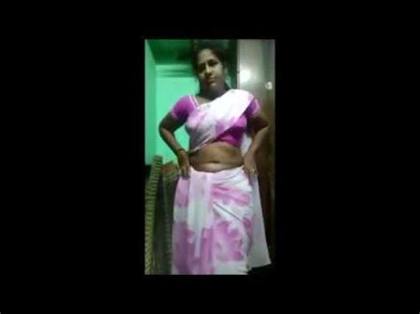 sexy tamil aunty video|Tamil Mom dress change captured his neighbours son